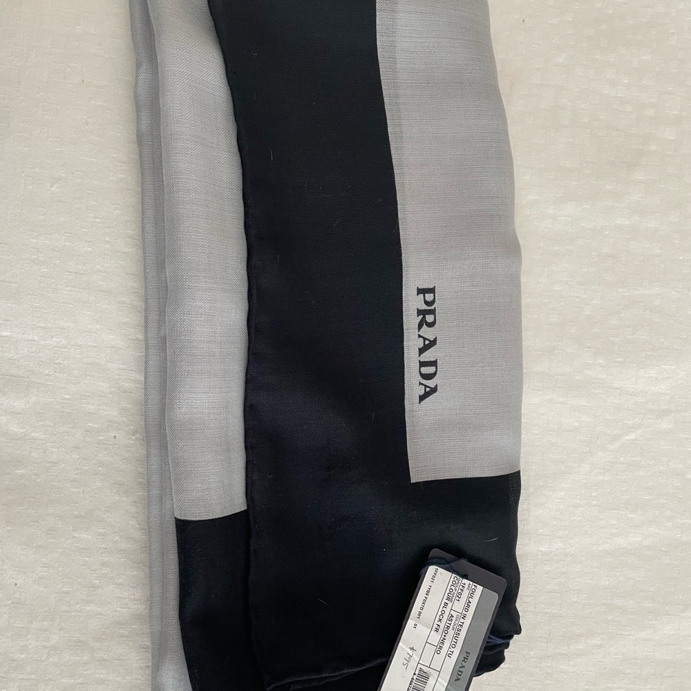 Prada scarf black and gray.                          70% virgin wool, 30% silk.